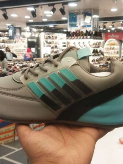 athletic shoe displayed in a store, ideal for morning walks and running available at Rushika bazar