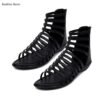 A pair of black high-top gladiator sandals with multiple straps and an open-toe design, offering a stylish and comfortable option for women.