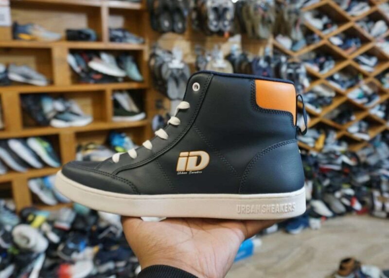 Navy blue and orange high-top ID Ultra Sports shoes with lace-up closure, cushioned sole, and durable rubber grip.